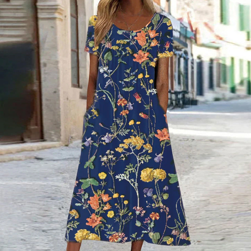 Wolff – Maxikleid im Bohemian-Stil mit Blumenmuster und Taschen | Kurzärmliges Maxikleid mit Blumenmuster im Boho-Chic-Stil für Damen