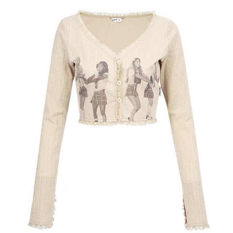 Damen cropped Langarmshirt mit einzigartigem Grafikdesign und dekorativen Knöpfen WOLFF
