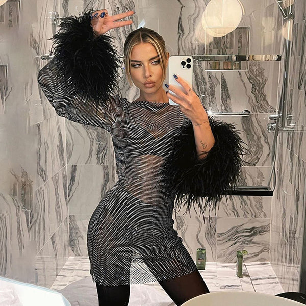 Damen Glitzerndes Netzkleid mit Puffärmeln WOLFF